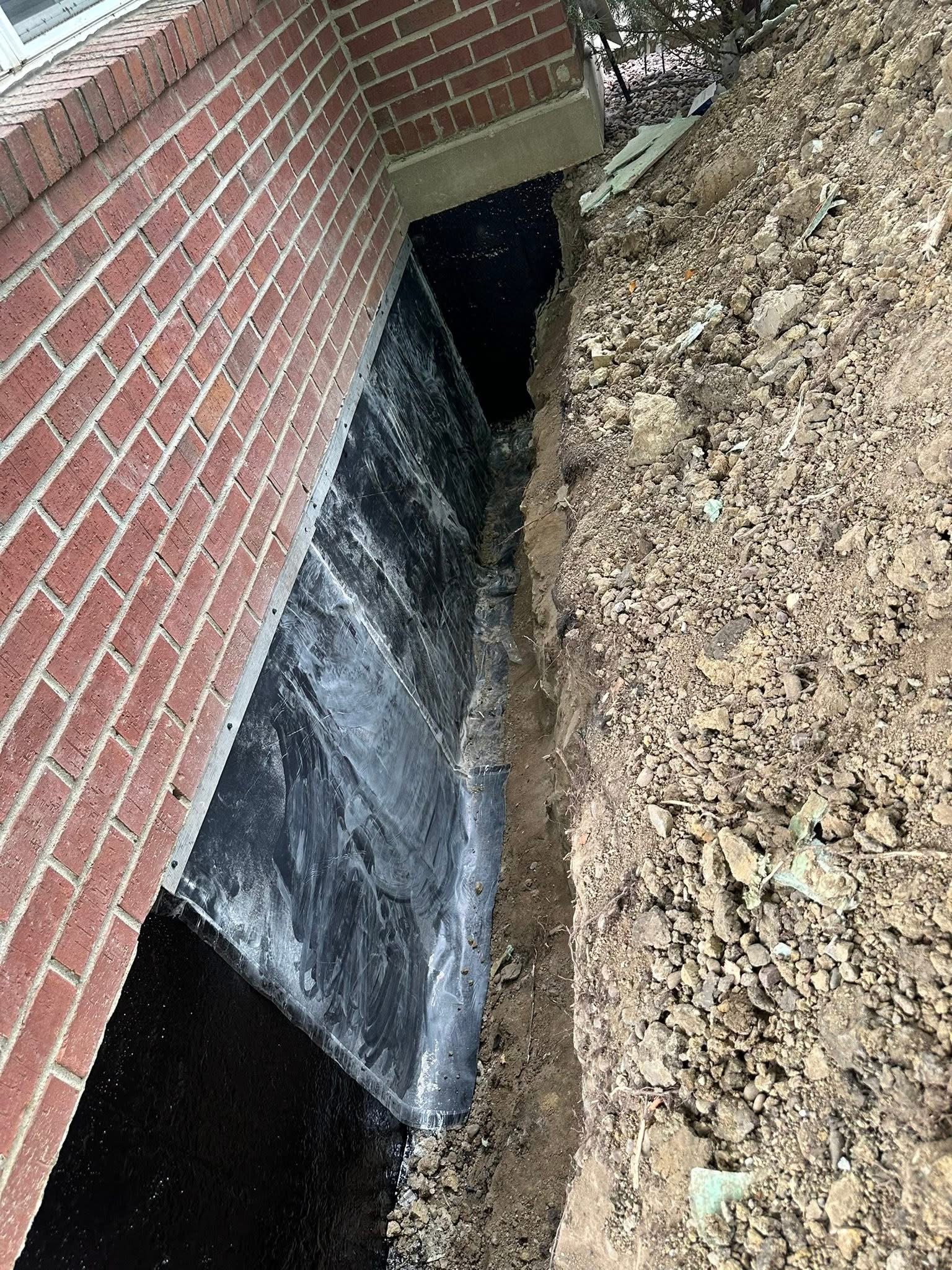 Sterling's excavation work along a home foundation