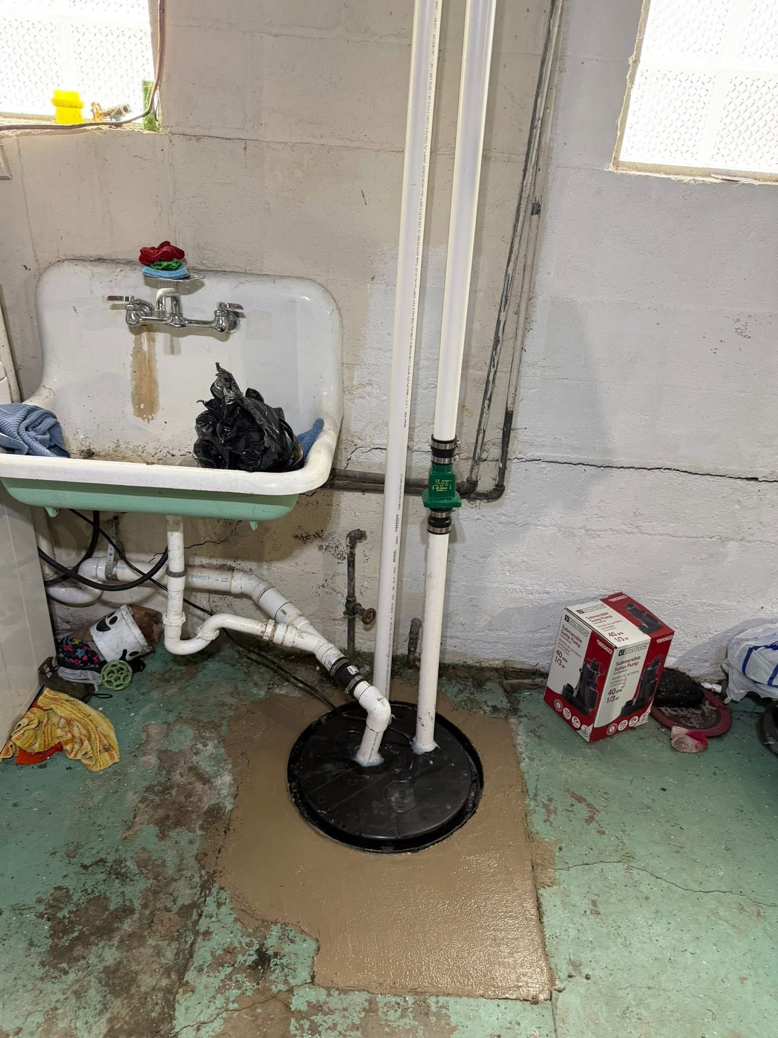 Sump drain line excavation and installation at a residence