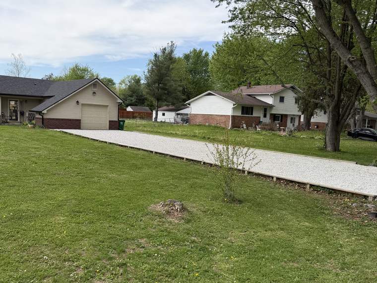 Front yard restored to grade after a drainage and driveway project