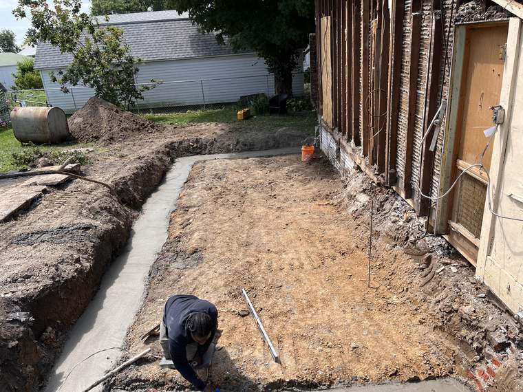 Footing trench and prepared base at a demolition and rebuild site