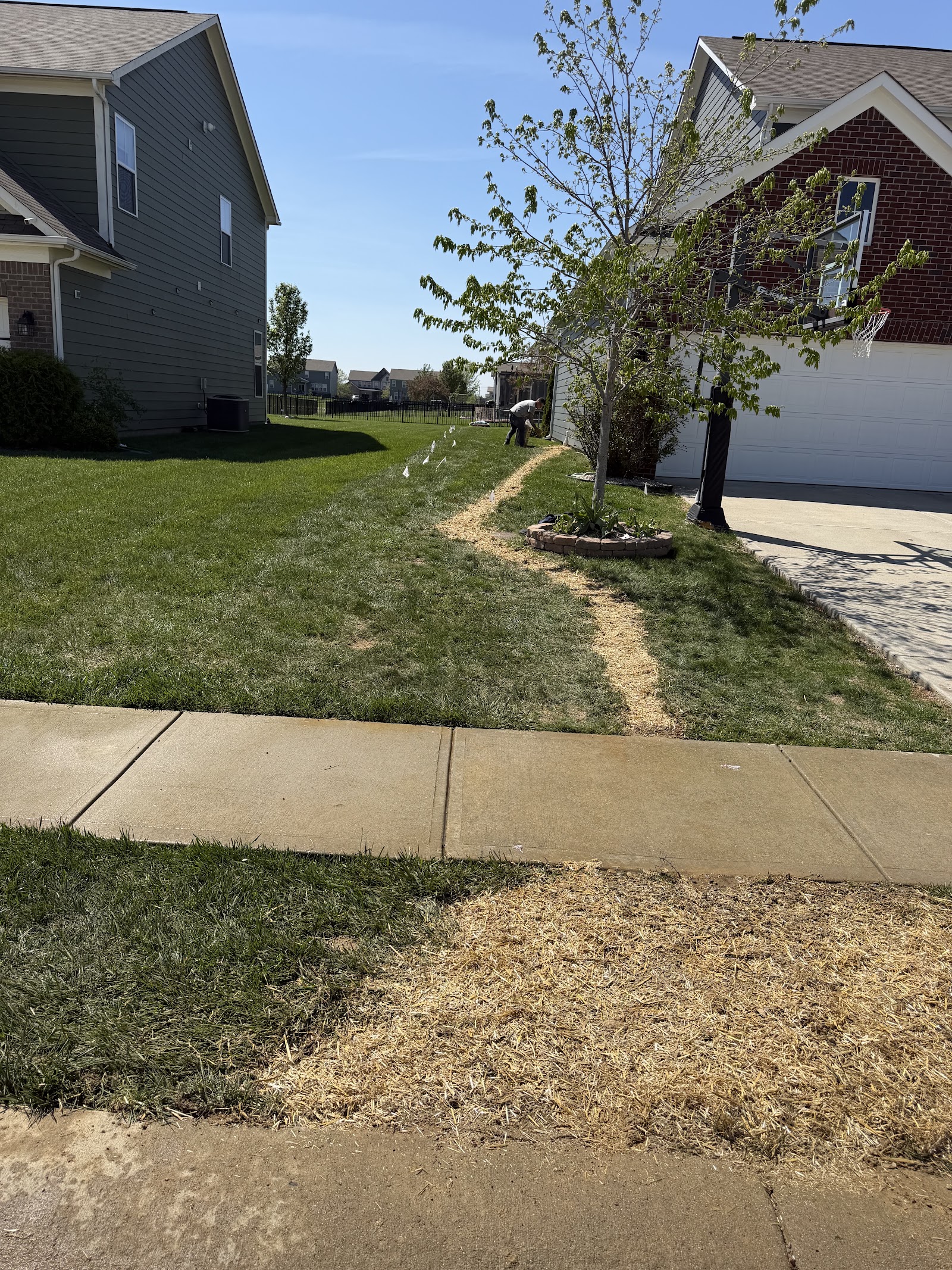Yard graded and shaped for proper drainage at an Indiana home